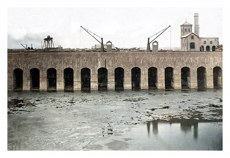 1865 – The beautiful symmetry and workmanship of the arched masonry quays