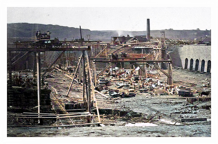 Early construction work. Note horses and elaborate temporary staging. 82.36