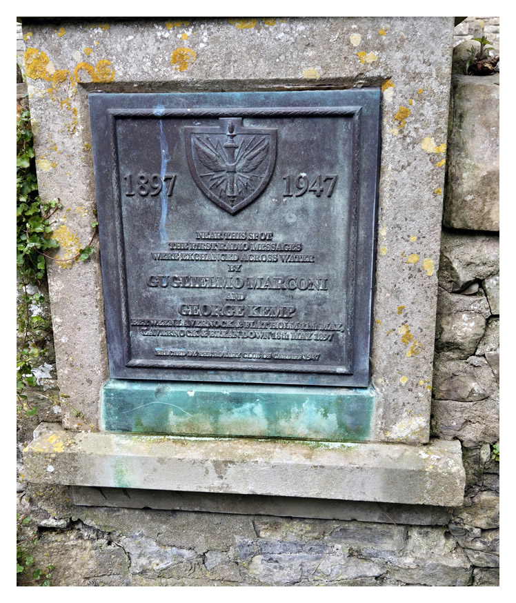 '1897 - 1947 - Near this spot the first radio messages were exchanged across water by Gugielmo Marconi and George Kemp between Lavernock & Flat Holm 11th May, Lavernock & Brean Down, 18th May 1897. Erected by the Rotary Club of Cardiff 1947.' 