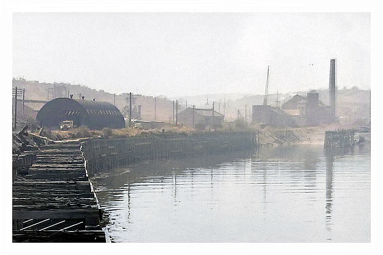 1950's - Another view upstream showing in detail a section of the decaying timber shoring structures that lined the southern bank of the River Ely.