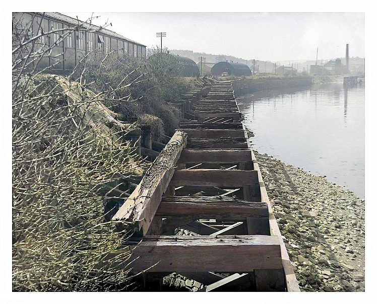 1950's - Another view upstream showing in detail a section of the decaying timber shoring structures that lined the southern bank of the River Ely.