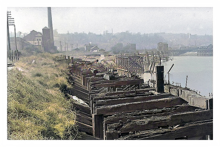 1950's - A view upstream of the slipway and gridiron location showing the derelict timber shoring adjacent to Penarth Dock but also sharing the banks of the River Ely Estuary. 