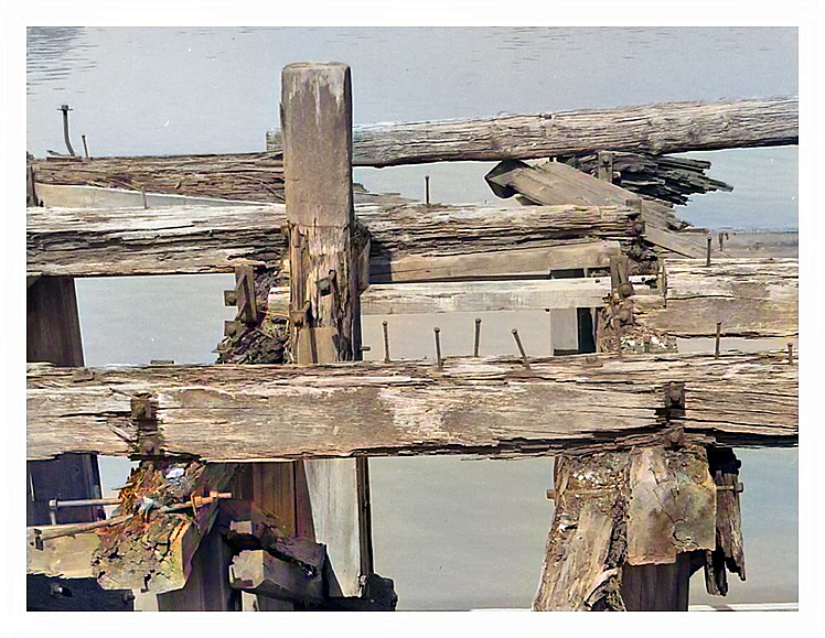 1950's - lower images - A view which illustrates the effects of half a century of River Ely weather and tides have on timbers. Just look at the size of those nails and the cracked and rotting baulks! 