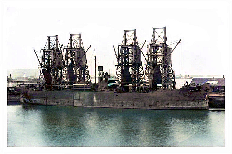 The collier &ldquo;Corcrest&rdquo; waiting to be loaded in June 1923 at tip numbers 15, 16, 17 and 18 within the basin at Penarth Dock.