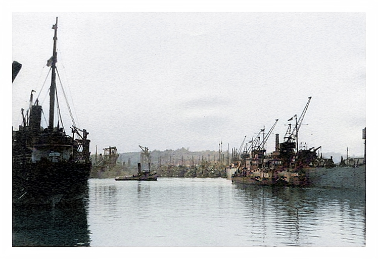1943-4 - A view up the Penarth Dock showing the LST's and the cargo moorings. 