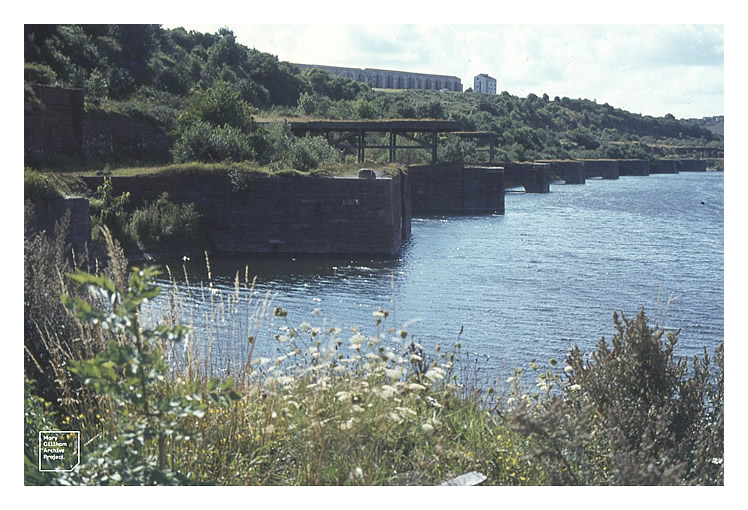 1979 - Penarth Dock south side complete with the remains of the 1865 coal tip arched masonry piers made of Radyr stone.