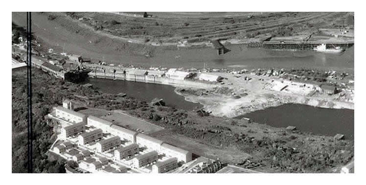 The dam across the dock shows signs of an area where the pontoon lay just below the surface and where attempts were made to recover the steel scrap failed with disastrous effect upon Mr. Eddie Avoth & Company!