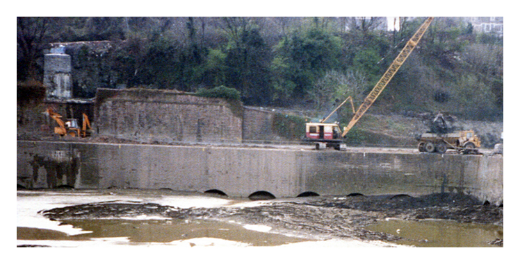 April 1987 - Construction of the Penarth Marina - A view across the Basin towards the south quay where the masonry works for the two coal tips of 1865 are situated. 