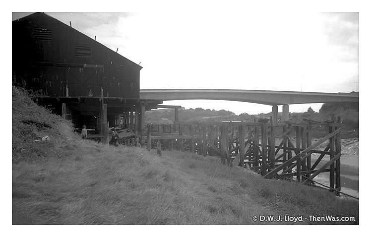 The approach to the old warehouse and tidal harbour moorings.