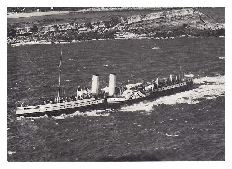 'The paddle steamer 'Britannia' of the P. & A. Campbell fleet off Sully Island in 1950.' 