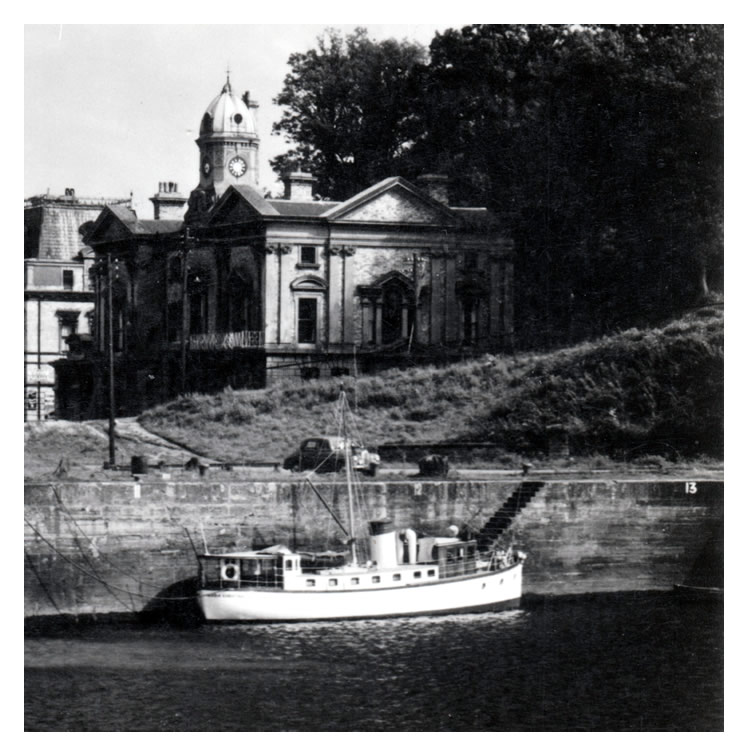 1950's - Penarth - Entrance to Docks - 'Above the quay is the old Customs House. The docks which cover 26 acres were opened in 1865. Photograph by Raymond Moore.' 