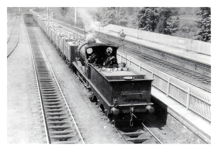 A down coal train passing through Radyr station in 1923, hauled by ex-TVR 'K' class 0-6-0 No. 1001 (TVR No. 359).
