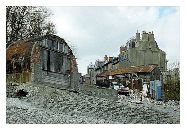A great view of the boathouse and the gable end of the Mercantile Marine Offices from the seaward end which was known as Penarth Dock Beach.