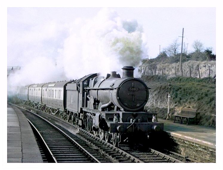 1953 - British Railways locomotive 5082 and passenger train passing through Dinas Powis station on the up line during June 1953.