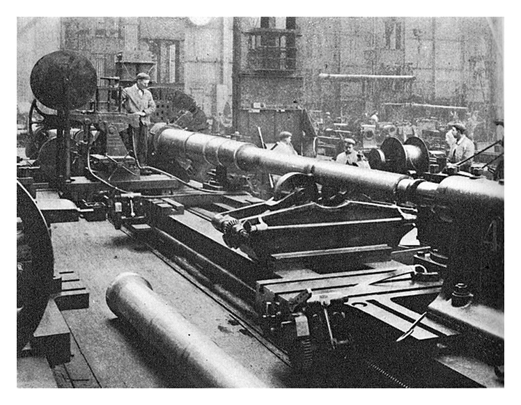 c.1900 - Machinery for winding the miles of reinforcing wire onto the barrels of heavy guns at Vickers, Sheffield, around 1900.