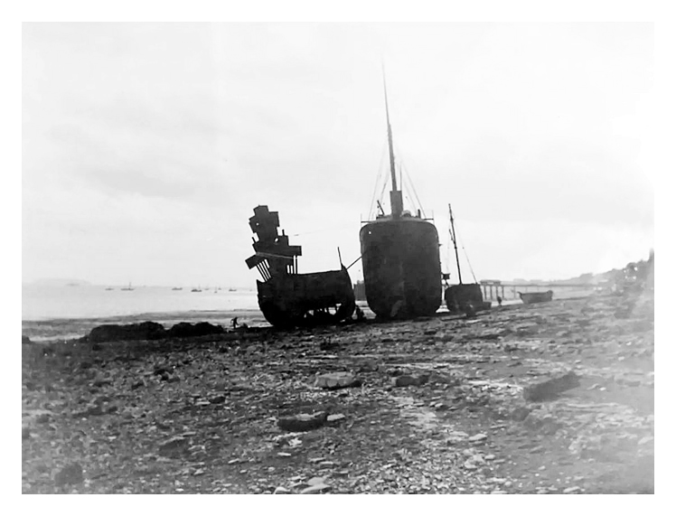 Mystery Photograph - Wrecks on Penarth Beach - A number of vessels stranded upon the beach at Penarth.