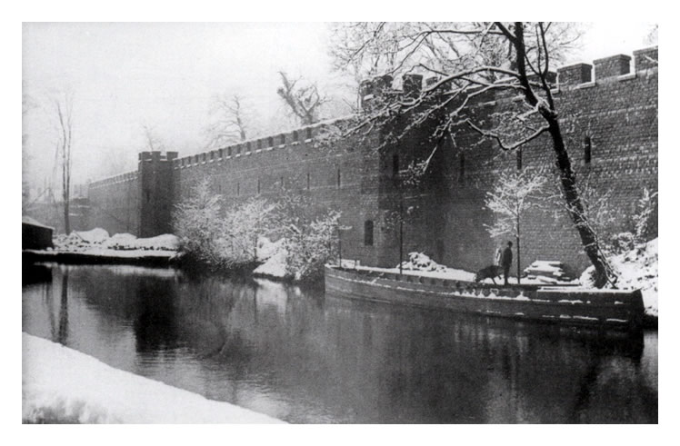 'A circa 1897 snow scene alongsde the walls of Cardiff Castle, where the (Glamorganshire) canal ran in the former moat just below North Road Lock.