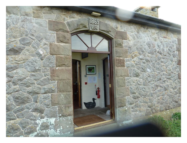 The Barracks - The entrance to the 'Barracks' where the keystone confirms the date of 1869 and 'V.R.' or rather 'Victoria Regina'.